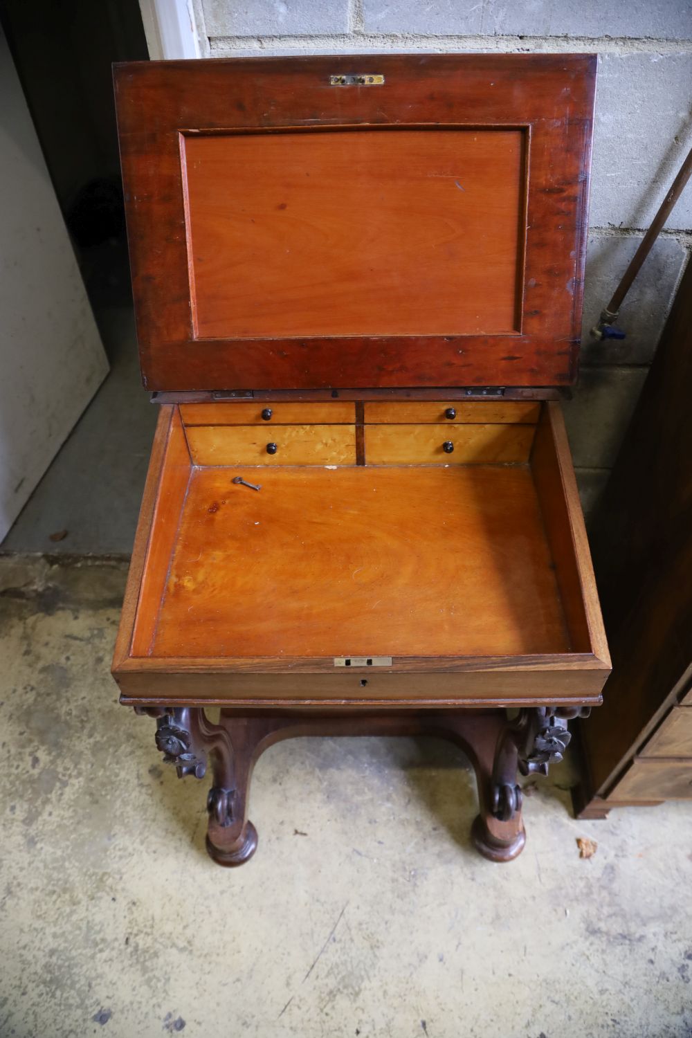 A Victorian figured walnut Davenport, width 56cm, depth 56cm, height 90cm